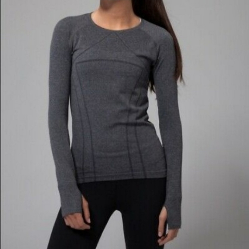 Ivivva tech shirt with thumb hole size 12 hard to find print